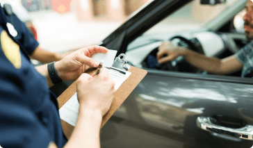 Driver getting a speeding ticket